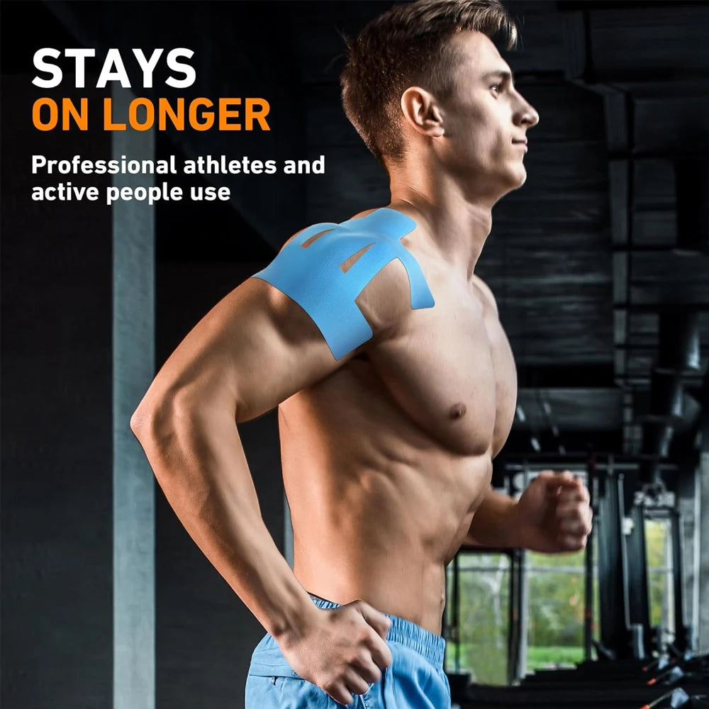 A muscular man wearing a blue kinesiology tape on his shoulder while exercising.