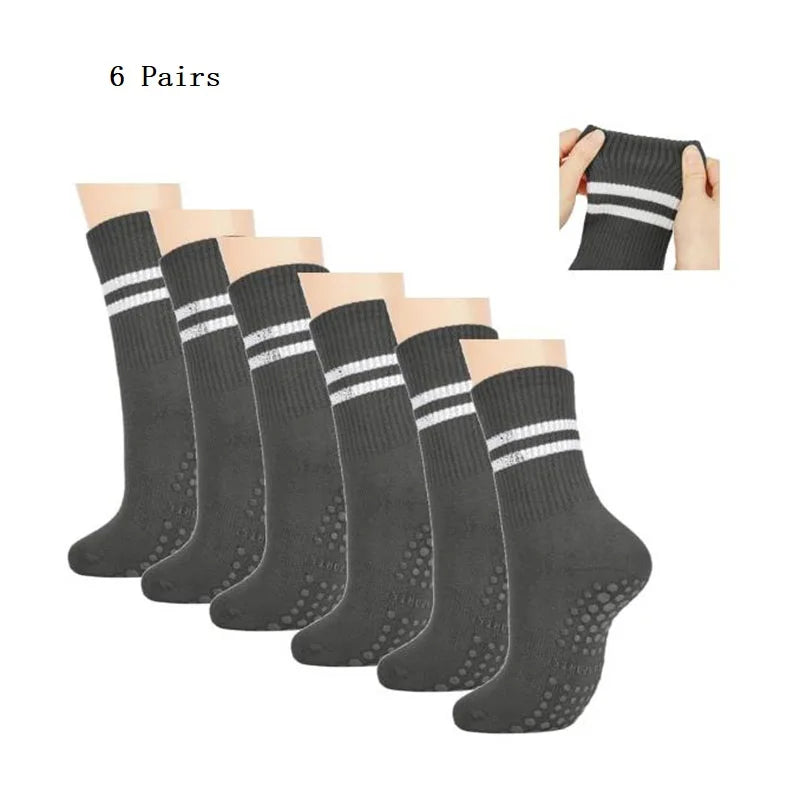 Six pairs of grey grip socks for yoga and barre exercises