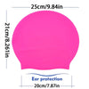 Pink silicone swimming cap measuring 25cm wide and 21cm tall for ear protection