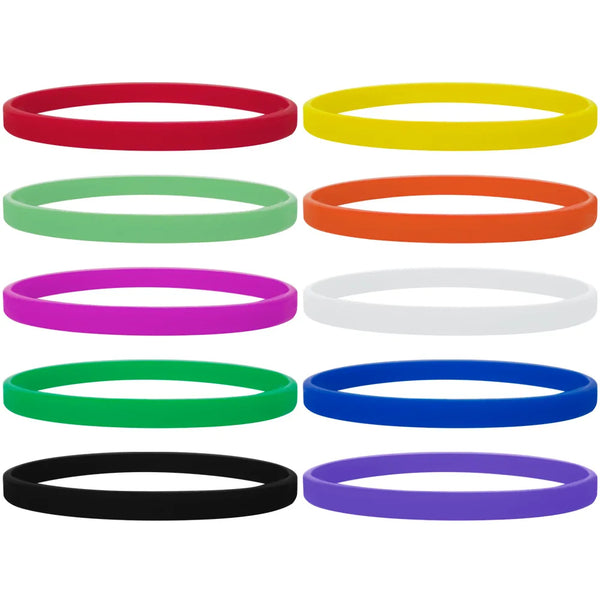A collection of nine colored silicone wristbands in various bright and dark colors.