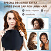 A woman shows a black silicone swim cap designed for long, curly hair and dreadlocks.