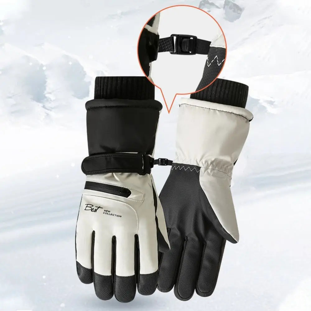 A pair of white and black thermal winter ski and riding gloves with zippered pockets shown against a snowy background.