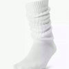 White slouch knit scrunch socks shown on a foot.