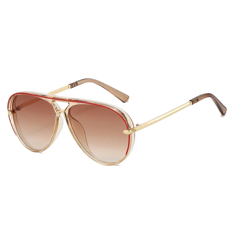 Retro pilot sunglasses with gradient lenses featuring gold-toned metal frames.