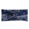 Navy blue bohemian print wide headband folded and displayed against a white background.