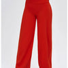 A model wears high-waist wide-leg yoga leggings in a vibrant red color.