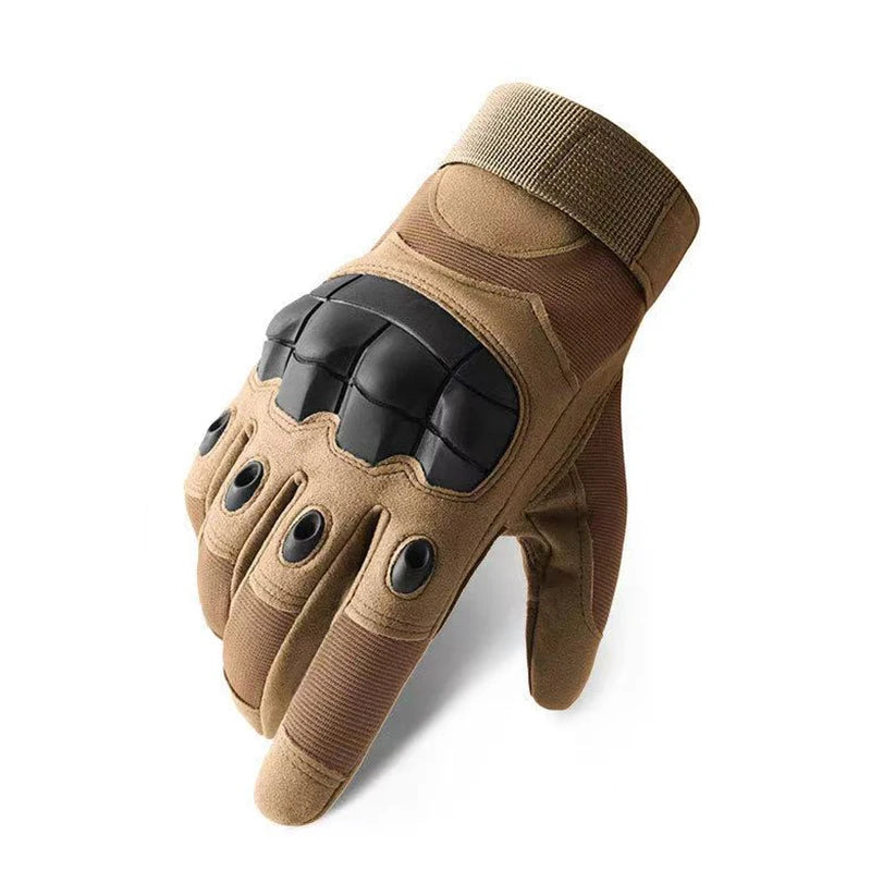 A pair of tan tactical sports gloves with black reinforced knuckles and a ribbed cuff.