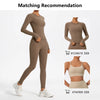 A matching set of taupe long-sleeved yoga leggings and sports bra for fitness.