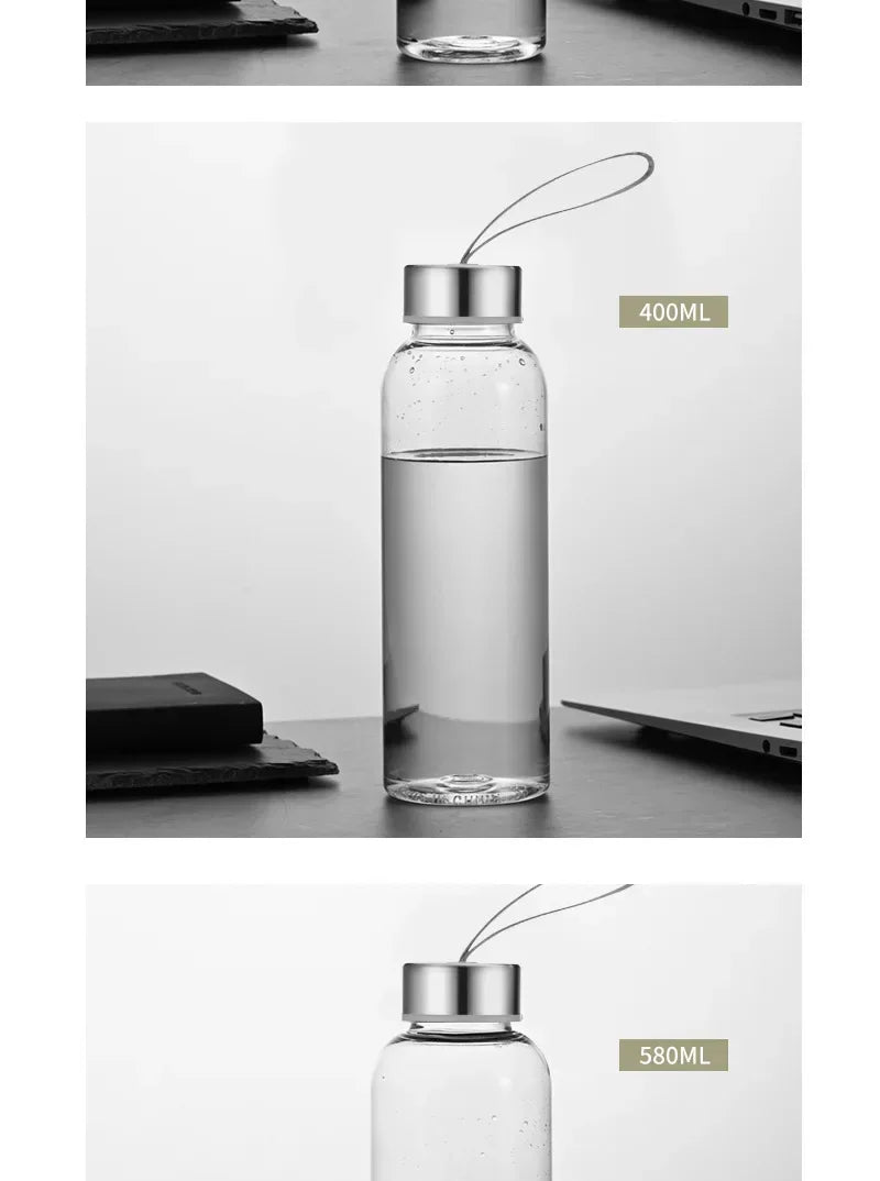 Botella deportiva de vidrio transparente con tapa plateada, mostrada en dos tamaños: 400ML y 580ML.