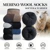 A stack of merino wool socks in various colors next to a sheep, highlighting elasticity, breathability, moisture-wicking, and