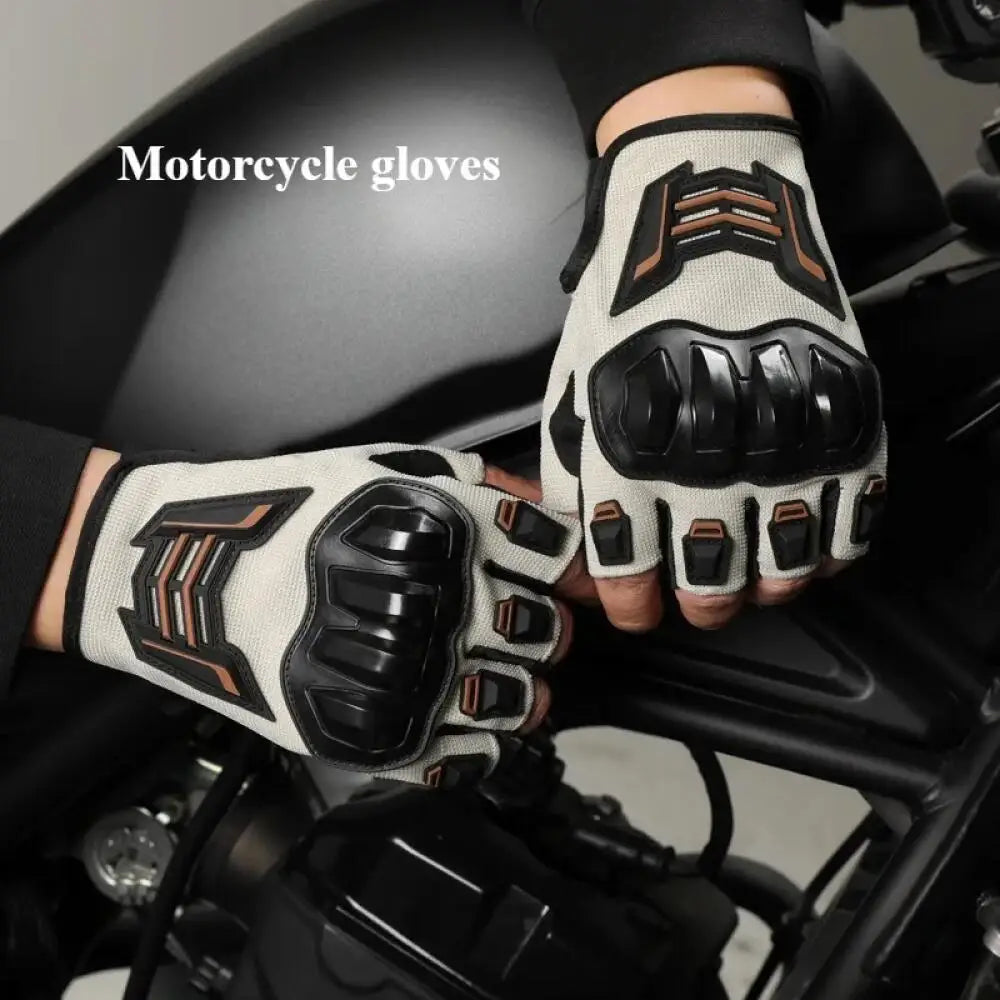 A close-up of breathable half-finger motorcycle gloves in black and tan leather on a hand.