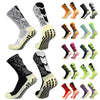 A collection of anti-slip training socks in various patterns and colors shown from different angles.