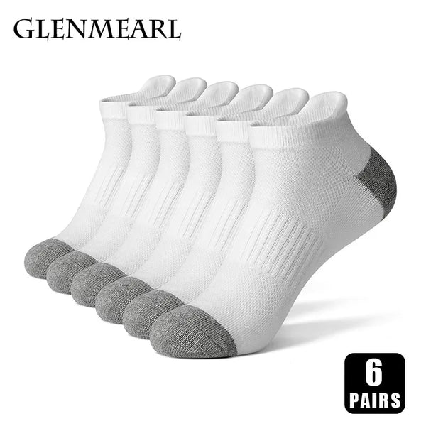 A stack of six pairs of white and gray men's cotton blend ankle socks for sports and running.