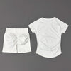 White seamless yoga set for women featuring a short sleeve top and workout leggings