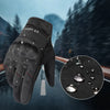 A dark gray thermal windproof outdoor glove is shown against a blurred road background with a magnified view of water droplet