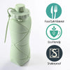 A light green collapsible silicone sports water bottle with a screw cap and a flexible carrying strap.