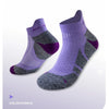 A pair of purple performance sports ankle socks shown flat lay.