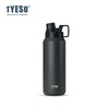 Tasse isotherme en acier inoxydable noir mat avec couvercle noir.