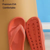 A pair of orange EVA flip flops shown next to a cardboard stand, highlighting the soft and comfortable upper foot.