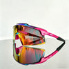 A pair of pink sports sunglasses with iridescent, multi-colored lenses resting on a white surface.