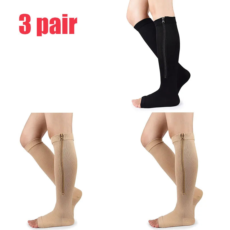 Three pairs of black compression zippered stockings shown on legs.