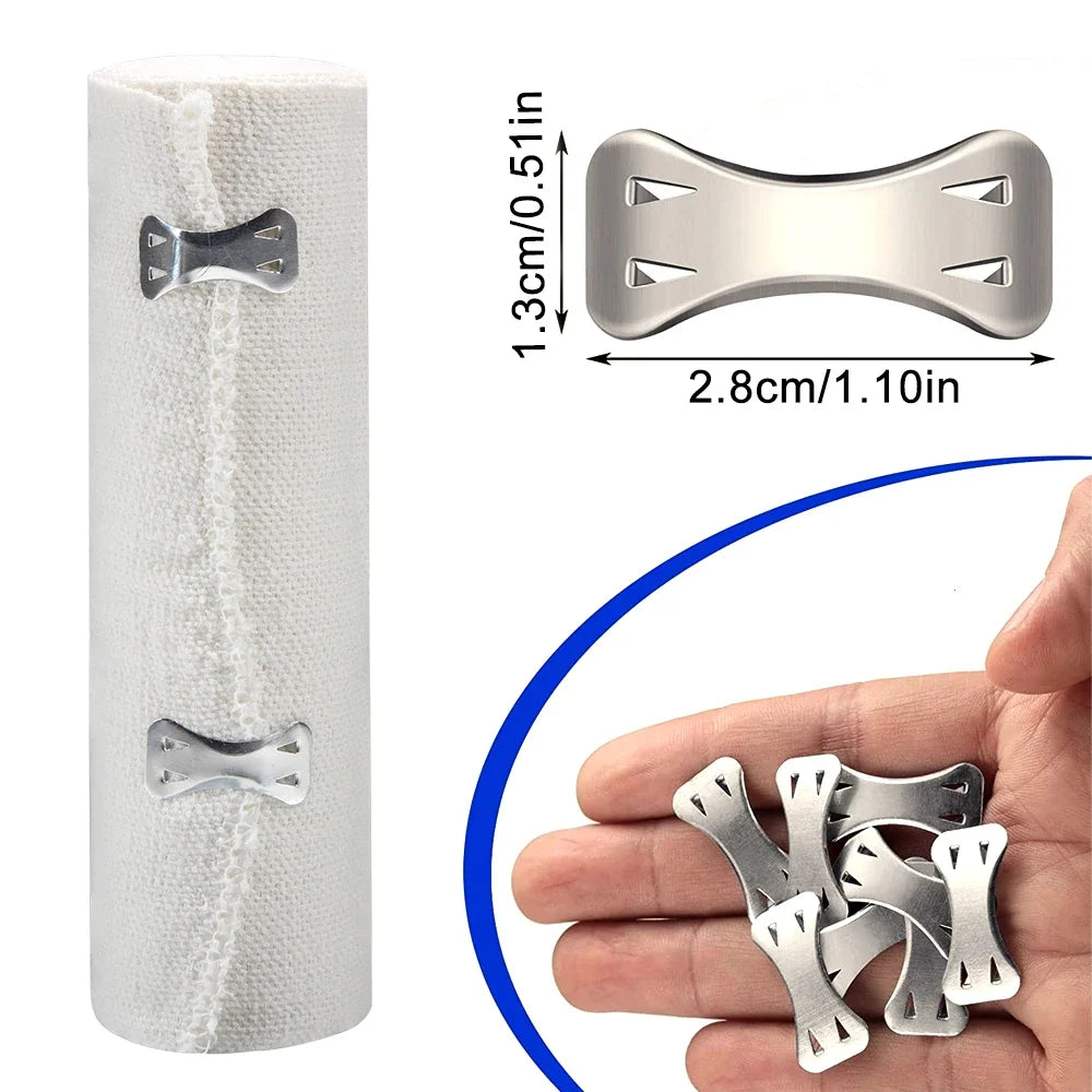 A white elastic compression bandage with silver fasteners and a hand showing multiple silver elastic fasteners.