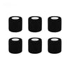 Four rolls of black tattoo grip bandage tape stacked horizontally.