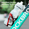 Bouteille d'eau Rockbros blanche avec support rouge à côté d'une bouteille de vélo.