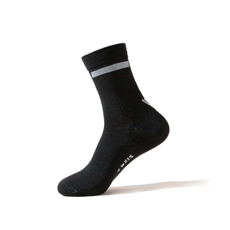Black performance athletic running sock with a light gray stripe detail