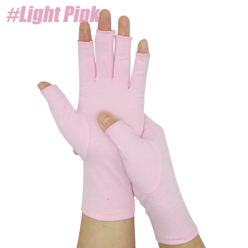Light pink comfort compression hand gloves worn on a hand.