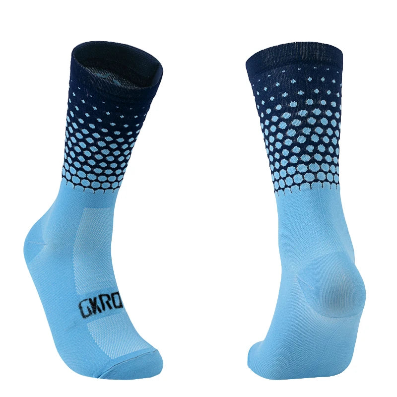 Pair of light blue compression socks with a dark patterned toe and heel