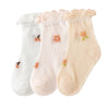 A pack of three thin summer casual baby socks in white, pink, and beige with floral patterns.