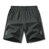 Black men's lightweight quick-dry running shorts shown flat lay.