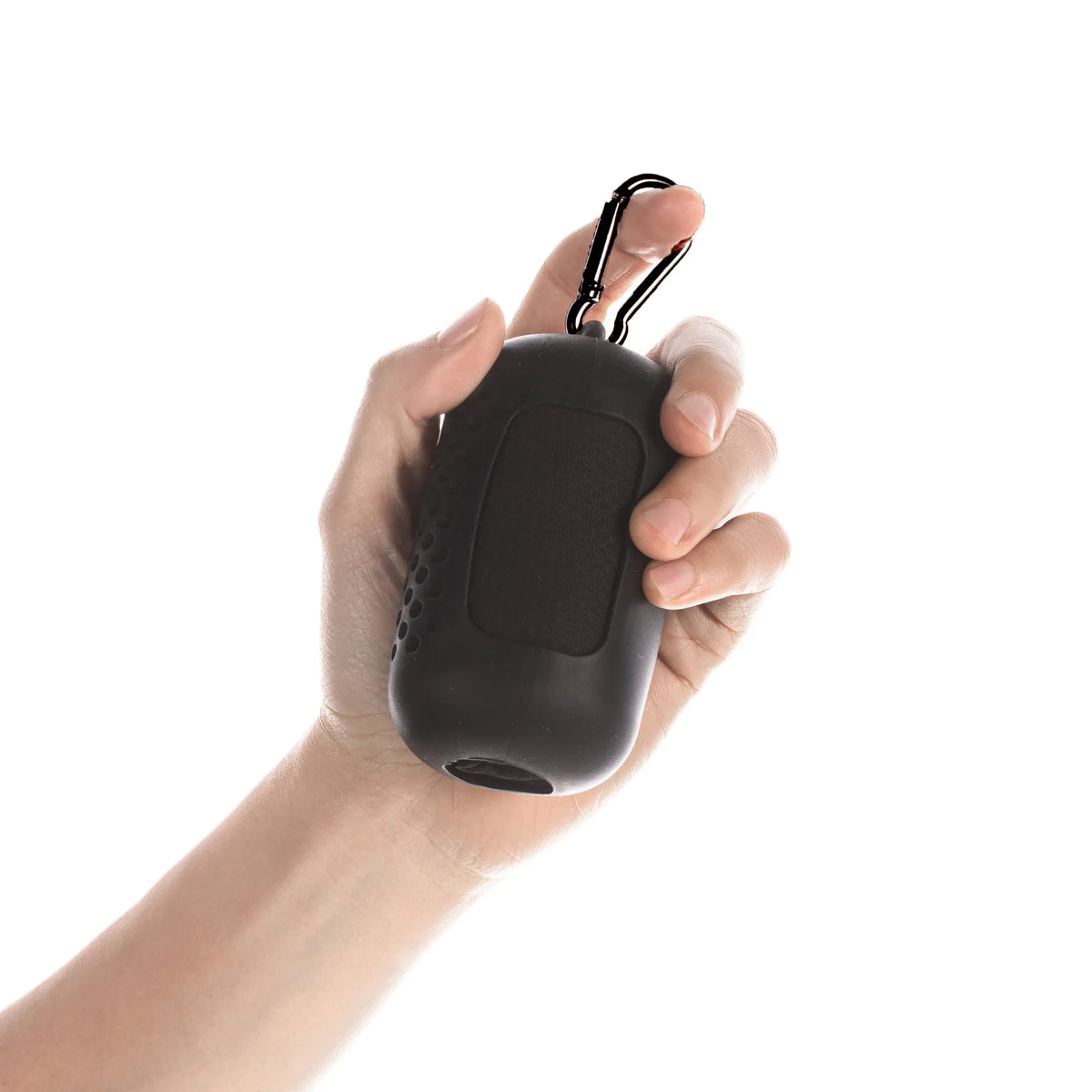 A hand is holding a black instant cooling towel for sports and fitness.