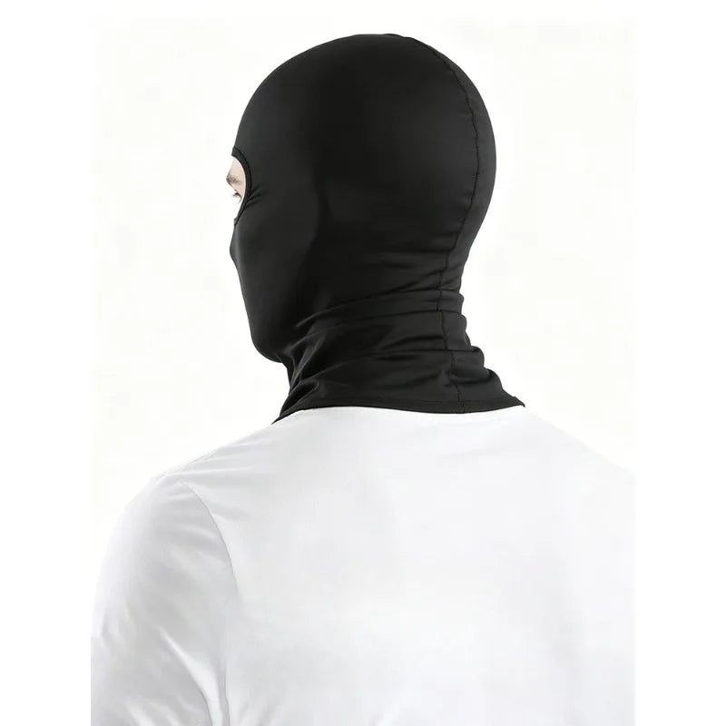 Black thermal balaclava and head covering worn on a person's head and neck.