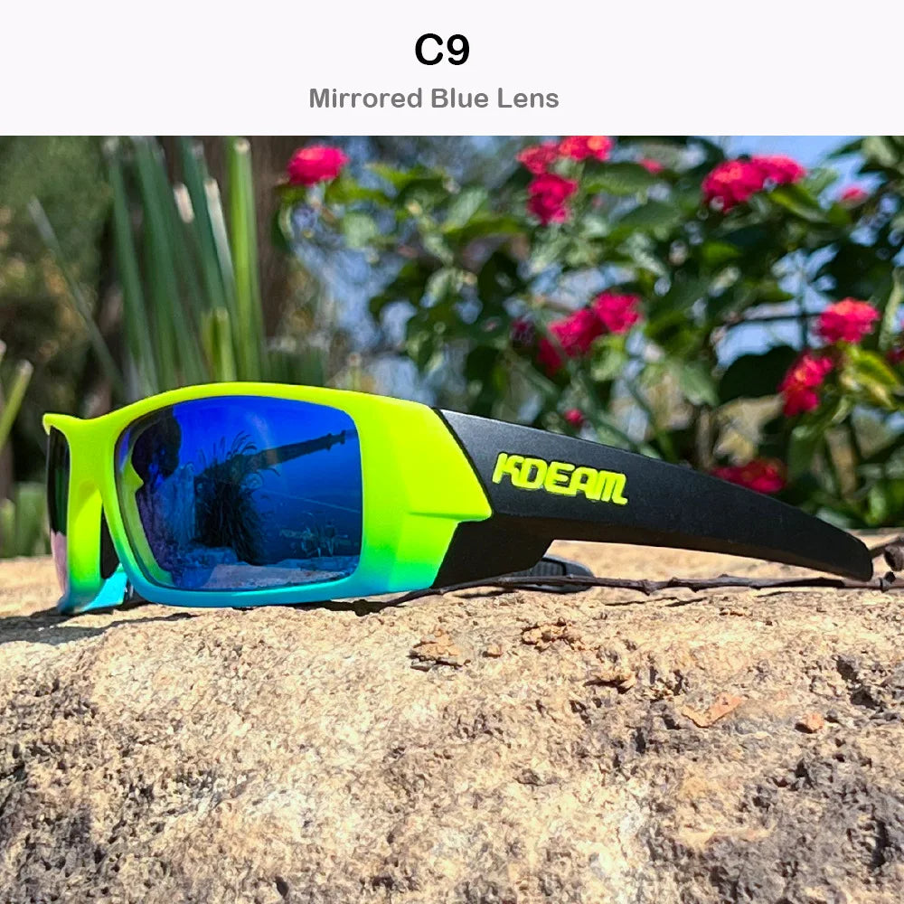 A pair of bright yellow-green mirrored blue lens sunglasses resting on a rough, light brown rock.