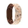 A beige stretch silicone wristband bracelet with a floral pattern and a brown strap.