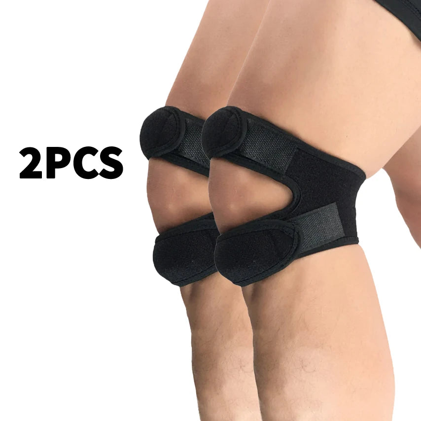 Two black pressurized knee support sleeves worn on the lower legs of a person.