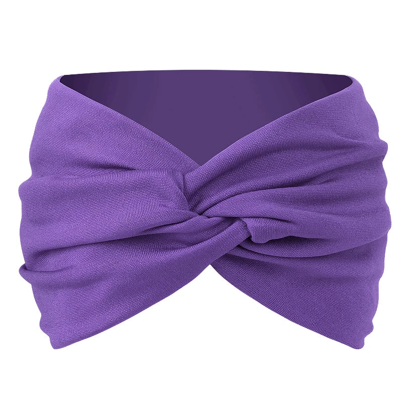 Purple twisted criss cross elastic headband for yoga and sports