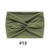 Olive green fabric headband folded into a criss-cross knot