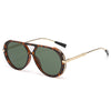Vintage oversized designer sunglasses with brown tortoise shell frames and olive green lenses