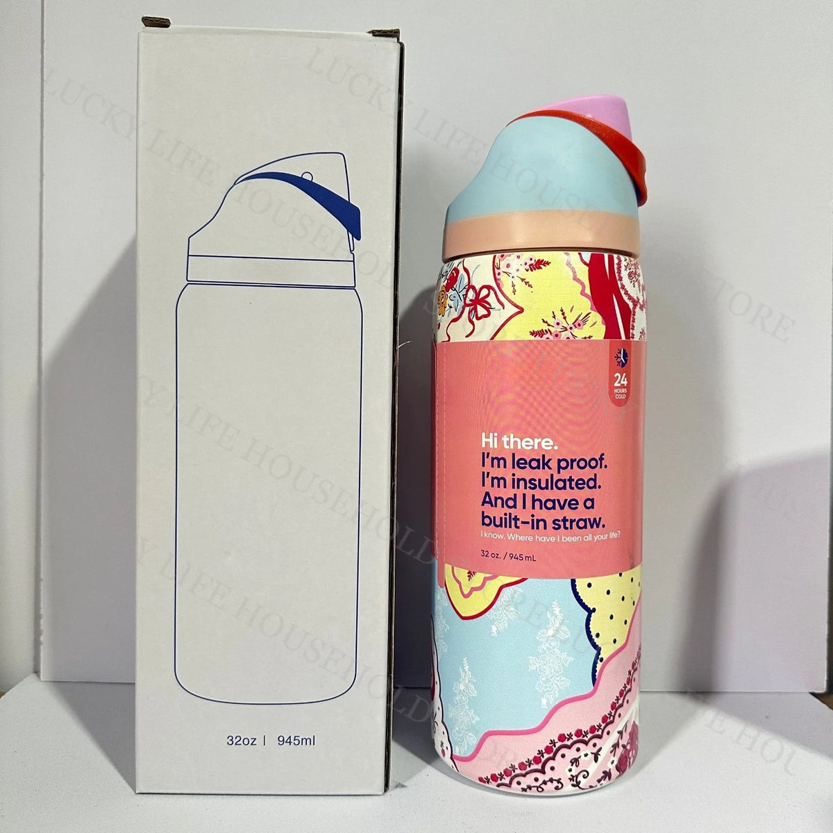 A pink and blue insulated stainless steel sports water bottle is shown next to its packaging box.