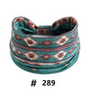 A teal patterned boho cotton turban headband with a maroon and cream geometric design.