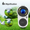 A white laser rangefinder device is shown next to a golf ball, demonstrating 6x magnification for measuring distance.