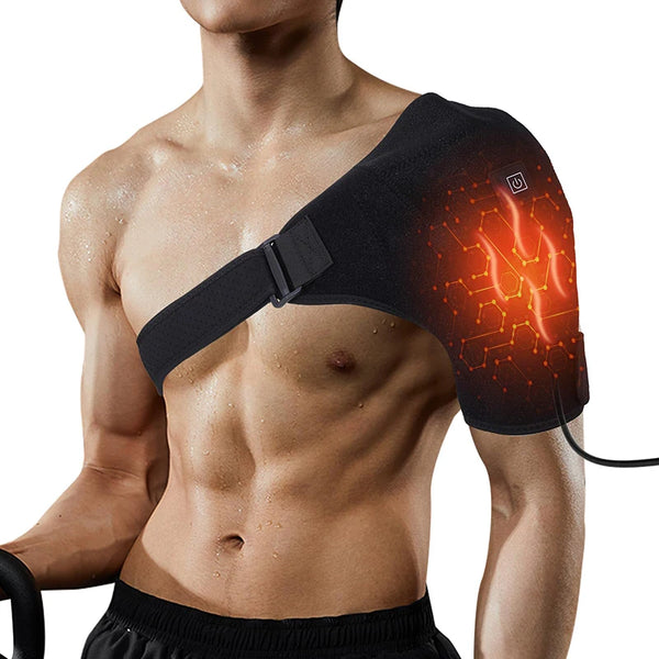A man wearing a black electric heating wrap on his shoulder, demonstrating its use for pain relief.