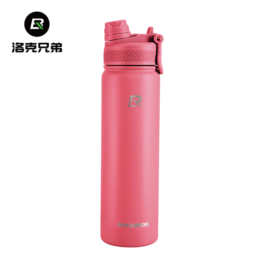 Termo de acero inoxidable aislado rosa con tapa negra y logotipo en el cuerpo.