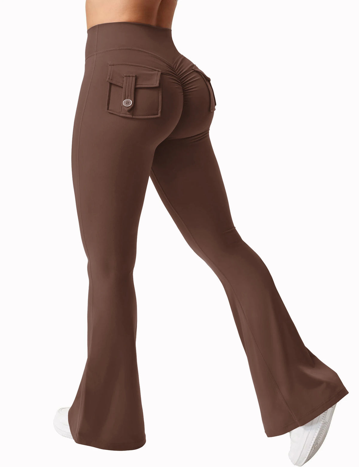 A brown high stretch women's yoga legging featuring a front pocket and a tapered fit.