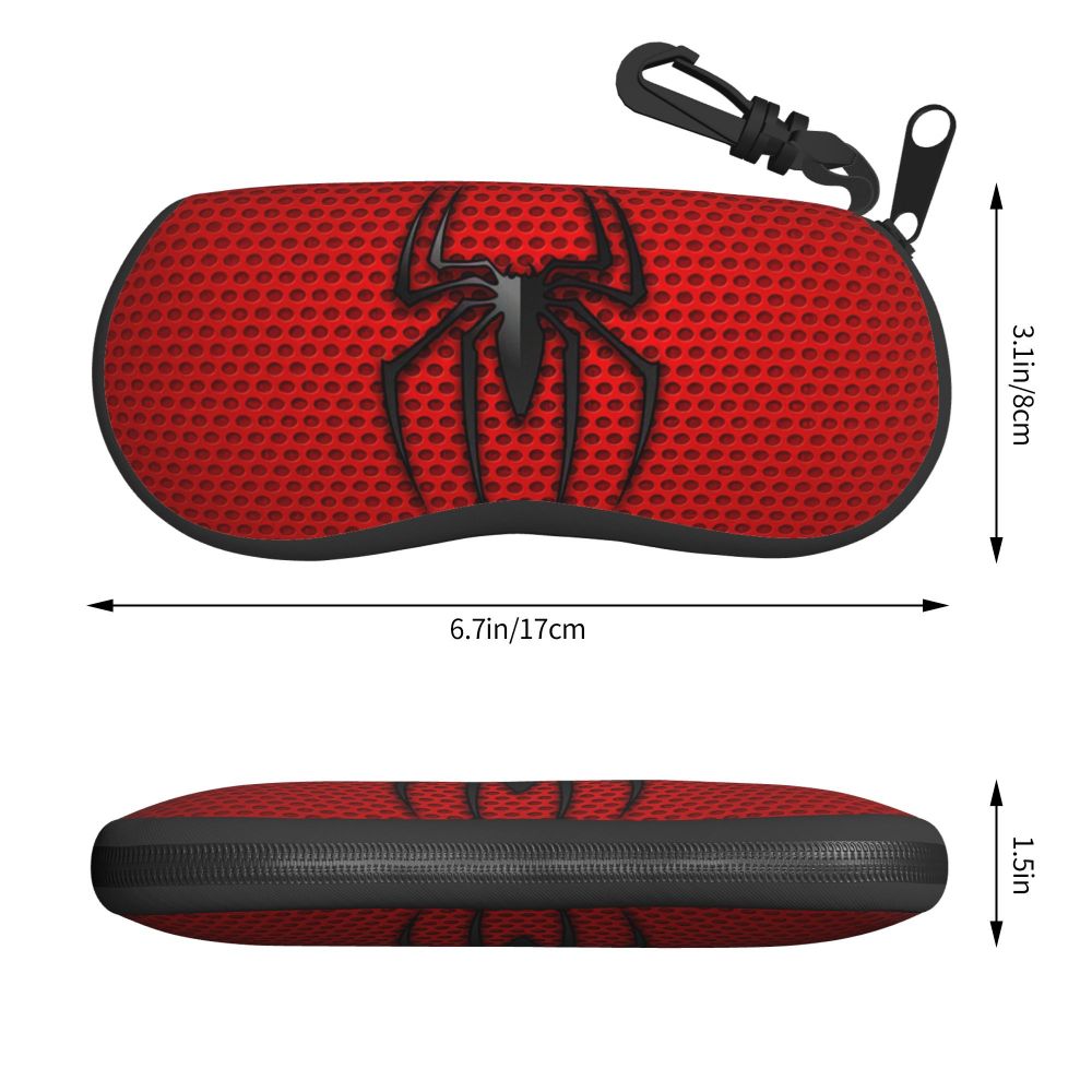 A black and red silicone pouch shaped like a spider with a hook for storing eyeglasses.