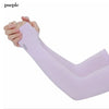 A purple long sleeve arm sleeve being held by a hand, demonstrating sun protection.