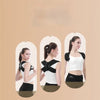 A woman wearing a black and white elastic yoga and fitness support belt for exercise.